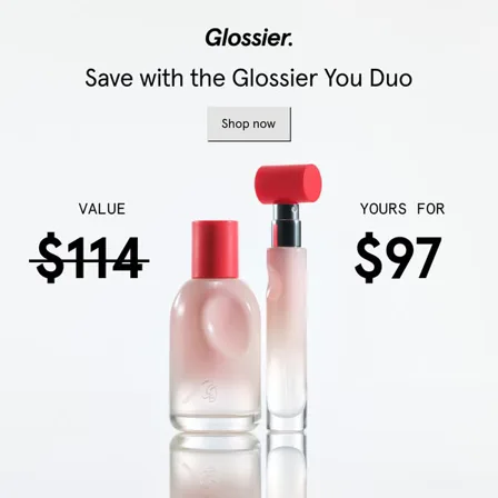 A Glossier image ad: two fragrance bottles between a struck-through value of 114 dollars and a price of 97 dollars