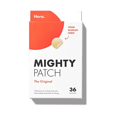 A Hero Cosmetics image ad: the Mighty Patch Original box on white with an arrow pointing at a single patch